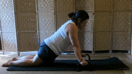 Debbie doing a pushup from her knees using pushup bars and then doing a pushup from her toes with her hands flat on the floor.